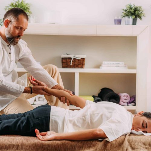 Shiatsu Hand Massage. Therapist massaging the heart meridian.